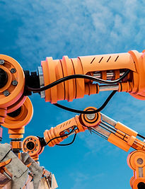 Orange industrial robotic machinery